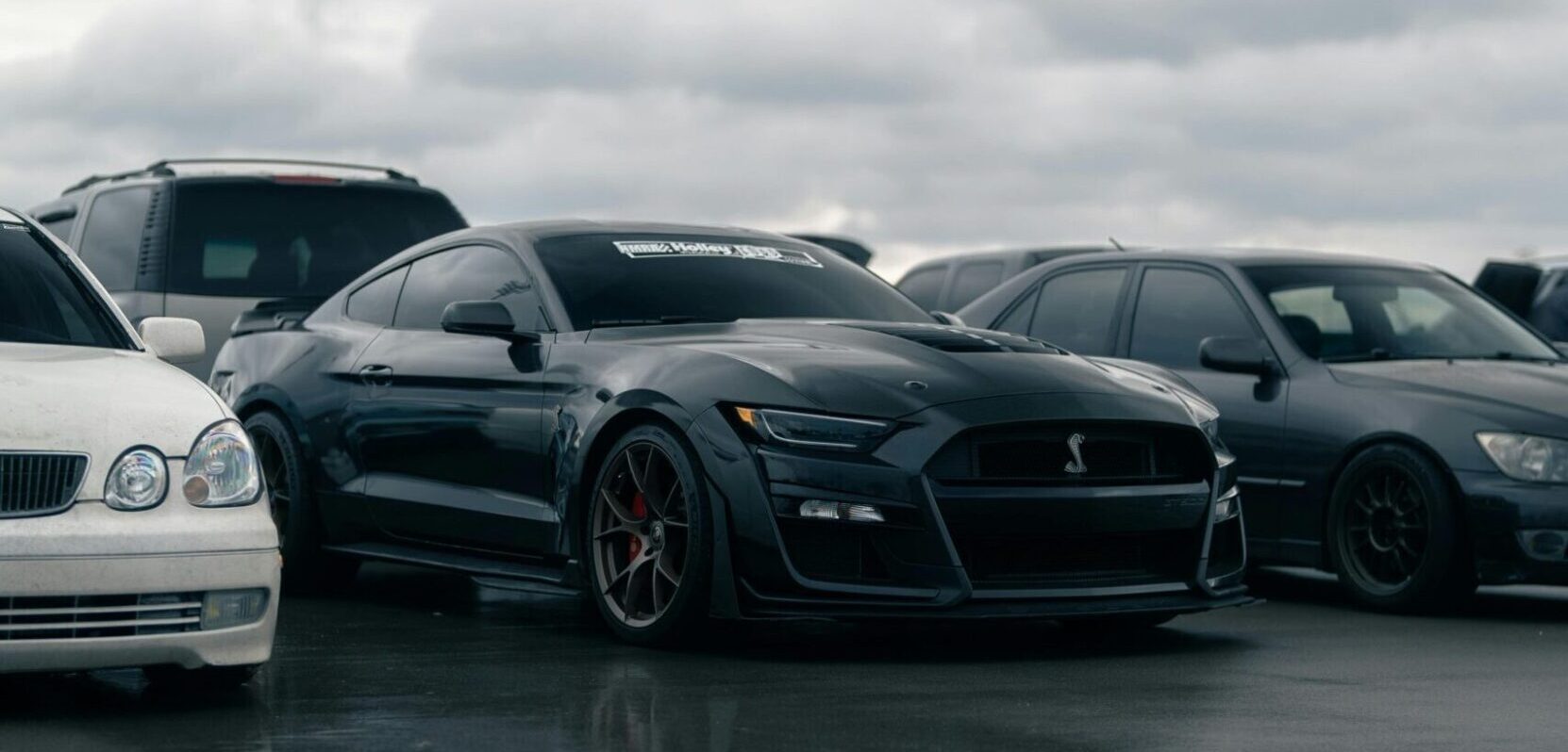 Elegant luxury car from one of the top 10 car brands in 2025 parked on a scenic road.