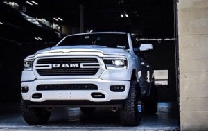 White RAM Car Parked under the garage
