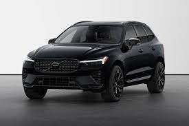 Black Volvo Car in front of white background